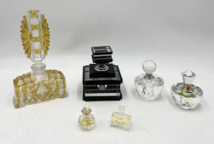 A collection of various vintage scent bottles along with two Dior perfume miniatures