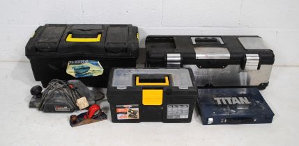 Three tool boxes containing various tools, including a Black & Decker planer, Titan drill bit set