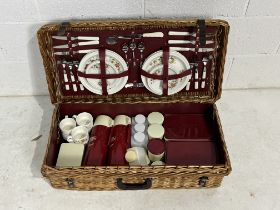 A large "The Brexton Collection" double picnic hamper including flasks cups, plates, bowls, cutlery,