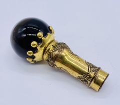 A Victorian parasol handle with 18ct gold plated mount and banded agate ball