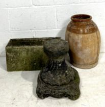 A small stone trough 46cm x 18cm, height 20cm, a painted stone base, height 33cm and a part glazed