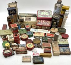 A large collection of branded vintage tins.