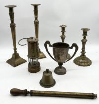 A collection of brassware including two pairs of candlesticks, miner's lamp by Lamp & Limelight