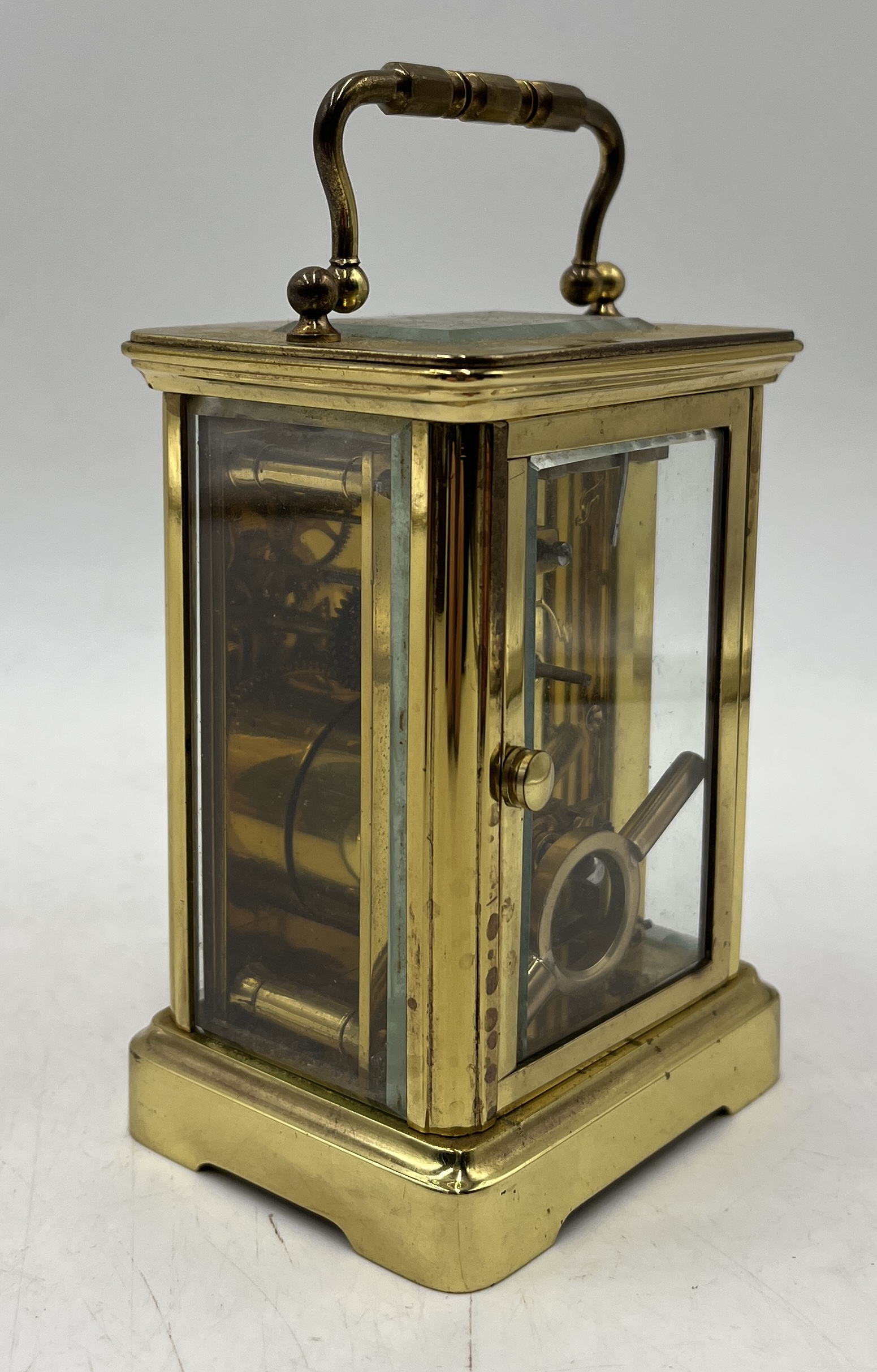 A brass carriage clock with porcelain dial and Arabic numerals - Image 3 of 4