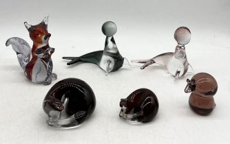 A collection of art glass animals including Murano seals, Langham otter etc.