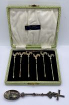 A cased set of six Sterling silver cocktail sticks with cockerel finials along with a Dutch silver