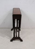 A Victorian mahogany Sutherland table, with turned supports