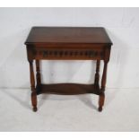 An oak hall table, with single drawer and carved detailing - length 68cm, depth 40cm, height 71cm