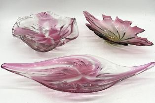 Three art glass bowls including large cranberry and white centrepiece