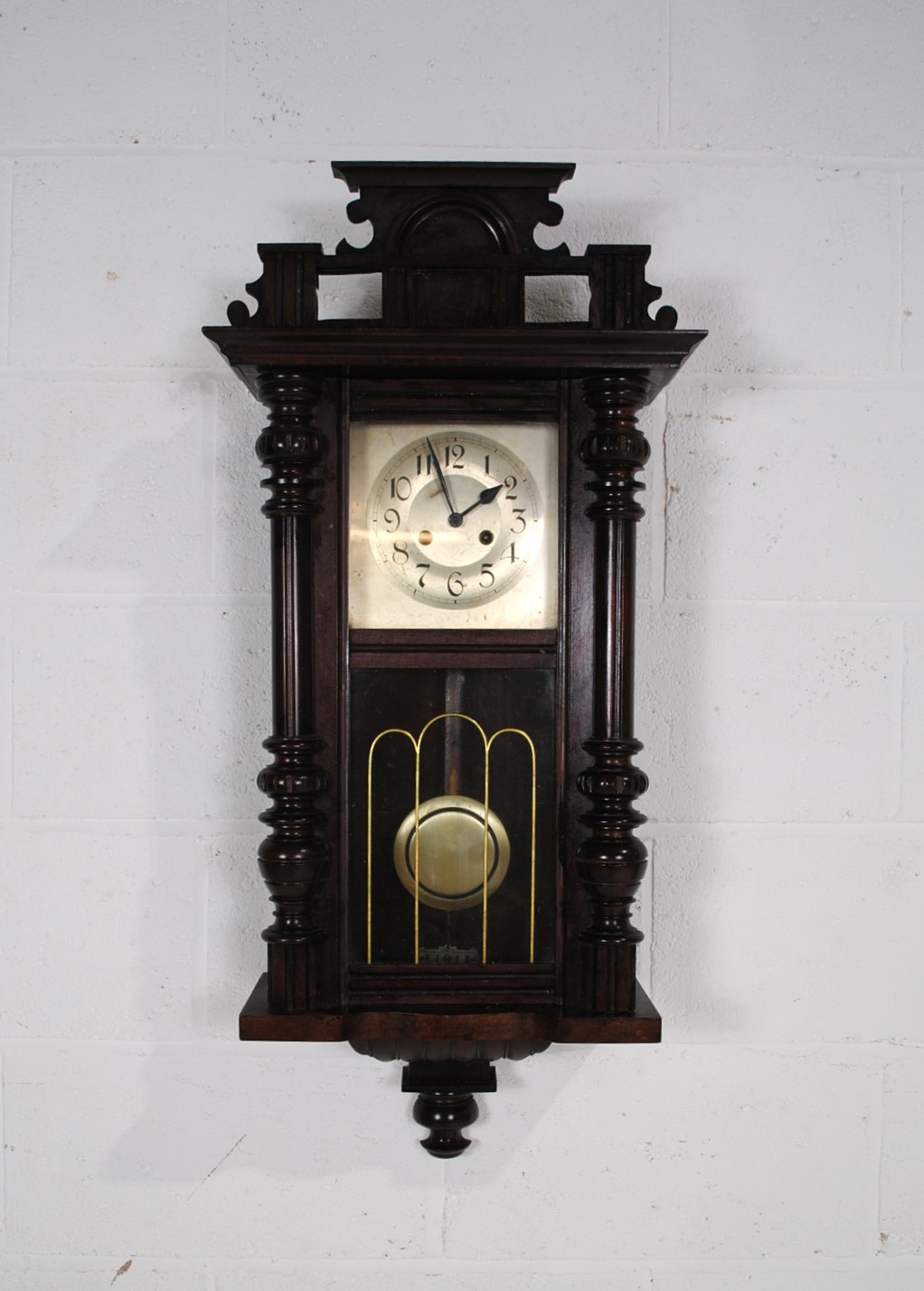 A mahogany cased wall clock