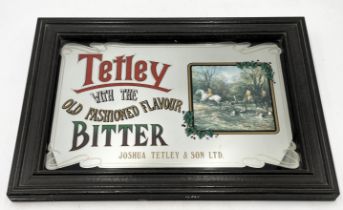 A Tetley bitter advertising mirror - 52cm x 39cm