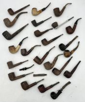 A collection of various tobacco pipes including Comet, Briar Wood, Compact etc.