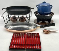 A vintage Le Creuset fondue set, pan, forks etc