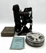 A Pathescope 200B projector with accessories, along with a Pathescope Motocamera, a Pathe 9.5mm