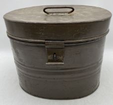 An antique tin hat box