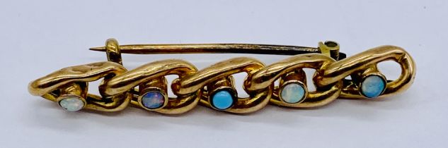 A 9ct gold brooch set with turquoise and opals, weight 2.5g