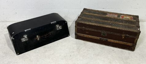 A vintage steamer trunk with numerous labels for Cunard White Star Line, Canadian Pacific, British