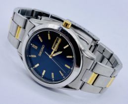 A gentleman's Seiko automatic wristwatch on stainless steel band. Blue dial with baton markings