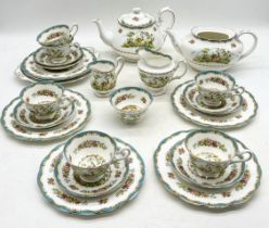 A Royal Albert "Chelsea Bird" pattern part tea set with six trios, teapot, milk jug, sugar bowl