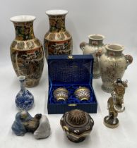 A collection of Eastern ceramics including two pairs of Japanese Satsuma vases, figures, small