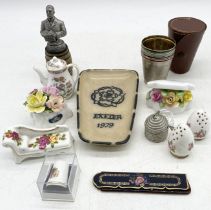A small collection of miscellaneous items including a leather cased set of silver plated tumblers,