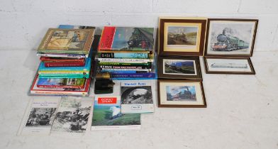 A quantity of books and prints on the subject of trains and railway interest over two shelves