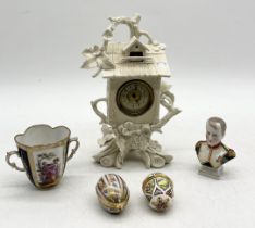 A collection of antique china including Augustus Rex cup, Limoges egg, bust of Napoleon etc.