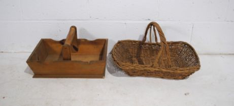 A vintage wooden trug, along with a wicker basket