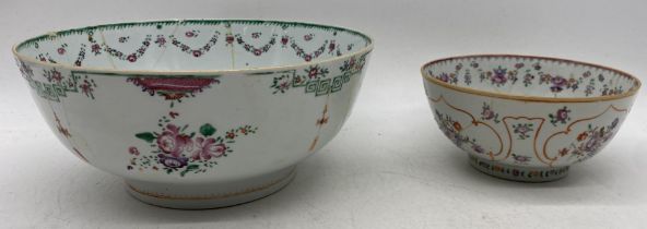 Two 18th/19th century Chinese porcelain bowls, both badly cracked and repaired, the larger 26cm in