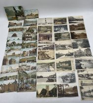 A collection of vintage postcards including Royal Navy