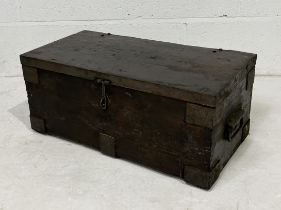 A vintage wooden metal bound tool trunk