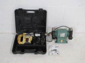 A boxed Axminster Power Tools AWSDS1050 hammer drill with instructions, along with a Kinzo 8E406
