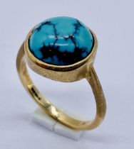 A 9ct gold ring set with turquoise, size M 1/2