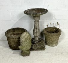 A reconstituted stone birdbath in three parts, a pine cone finial (a/f) along with two reconstituted