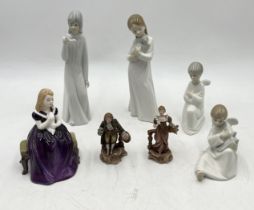 A collection of various ceramic figures including Royal Doulton, Nao etc.