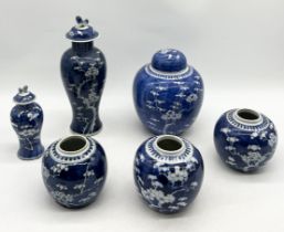 A collection of Chinese blue and white lidded vases and ginger jars with floral decoration and foo