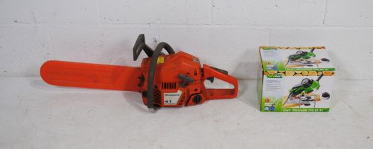 A Husqvarna 41 air injection petrol chainsaw, with boxed Florabest chain sharpener