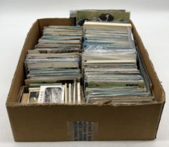 A large collection of vintage postcards