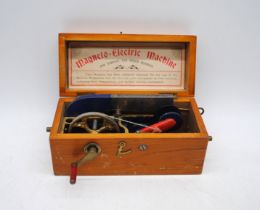 A Magneto-Electric Machine, in wooden case