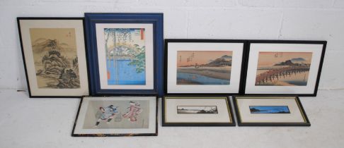 A quantity of various framed Oriental pictures and prints, including some with character signatures