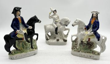 Three Staffordshire figures comprising of Dick Turpin, Tom King and one other