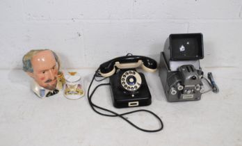 A vintage bakelite telephone, along with a Muray cine viewer, a Royal Doulton Shakespeare