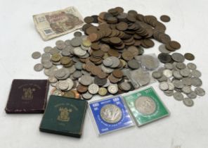 A collection of various coinage including silver and part silver