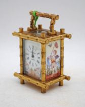 A miniature carriage clock by 'Elliot & Sons', with hand painted panels