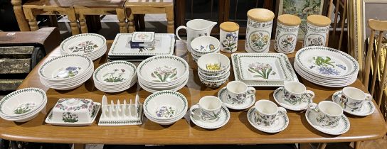 A large collection of Portmeirion tableware and ceramics including lidded jars, cups, saucers,