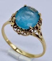 A 9ct gold ring set with topaz, size P