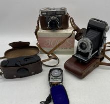 Three vintage cameras etc. Ricoh, Beck Anastigmat and Kodak