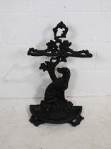 A reproduction Victorian style cast iron umbrella/stick stand