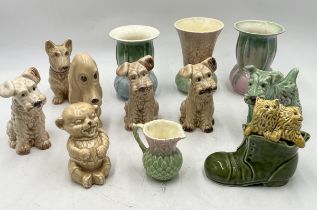 A collection of Sylvac vases and animals including Sad Sam, terriers, bear etc.