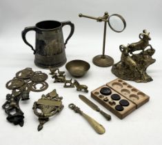 A collection of various items including brass magnifying glass on stand, large silver plated "